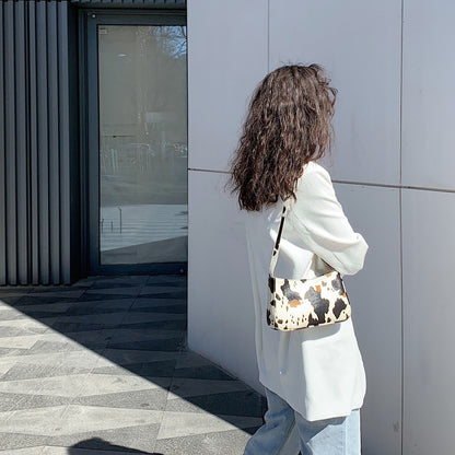 Cowhide-Inspired Baguette Bag