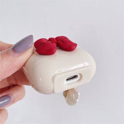 Beige Wireless Earphone Case with Red Bow & Shell Pendant – Cute Protective Cover