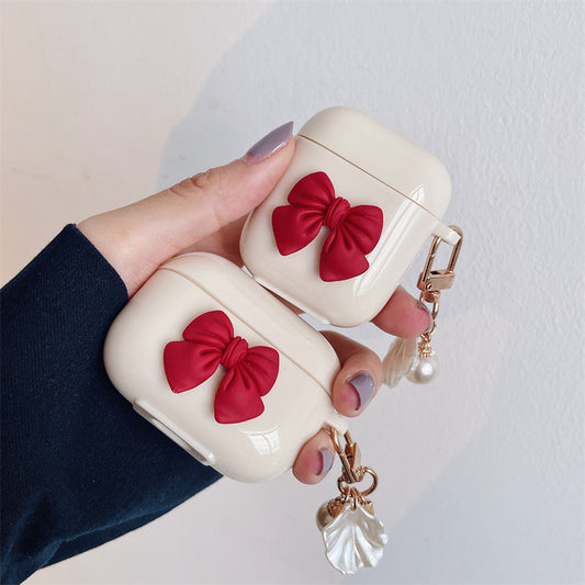 Beige Wireless Earphone Case with Red Bow & Shell Pendant – Cute Protective Cover