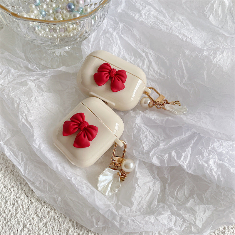 Beige Wireless Earphone Case with Red Bow & Shell Pendant – Cute Protective Cover